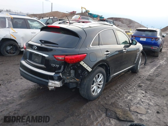 2015 Infiniti QX70 with VIN JN8CS1MW2FM480768, listed as a IAAI auction lot 41229824 with 149,146 mi miles and . Bid and sale history available at DreamBid. Image 4.