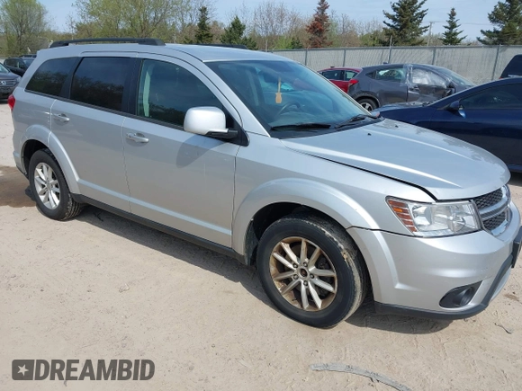 2014 Dodge Journey SXT z VIN 3C4PDDBG8ET155636, wystawiony jako IAAI lot #42215777 z przebiegiem 193 708 mil mil oraz . Historia ofert i sprzedaży dostępna na DreamBid. Obrazek 1.