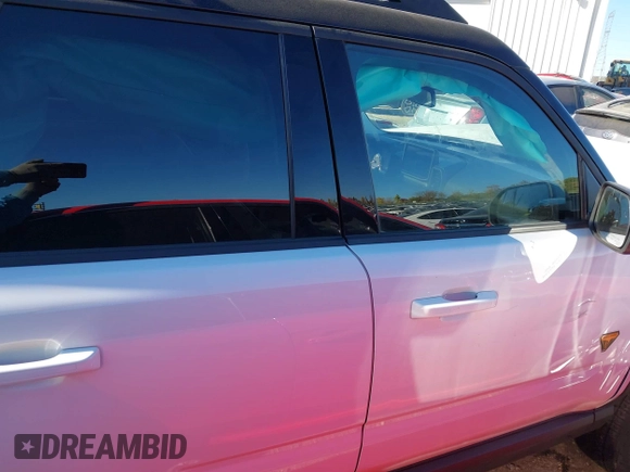 2023 Ford Bronco Sport Badlands z VIN 3FMCR9D93PRD33699, wystawiony jako IAAI lot #40632148 z przebiegiem 21 363 mil mil oraz . Historia ofert i sprzedaży dostępna na DreamBid. Obrazek 13.