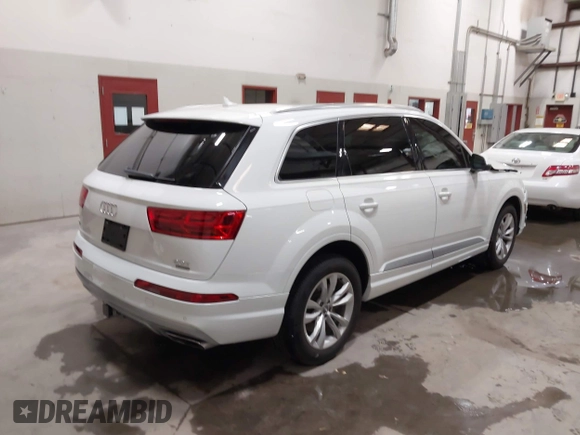 2018 Audi Q7 Premium Plus with VIN WA1LAAF73JD028903, listed as a IAAI auction lot 42044235 with 113,033 mi miles and . Bid and sale history available at DreamBid. Image 4.