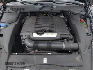 2014 Porsche Cayenne with VIN WP1AA2A29ELA97300, listed as a IAAI auction lot 42106931 with 156,129 mi miles and . Bid and sale history available at DreamBid. Image 10.