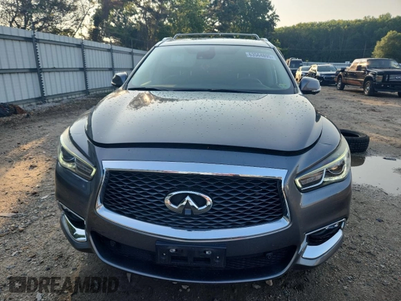 2019 Infiniti QX60 Luxe with VIN 5N1DL0MMXKC522444, listed as a Copart auction lot 63564895 with 99,748 mi miles and Salvage title. Bid and sale history available at DreamBid. Image 5.