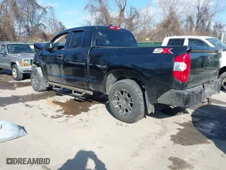 2020 Toyota Tundra 4WD SR with VIN 5TFUY5F15LX879515, listed as a IAAI auction lot 41420497 with 146,044 mi miles. Bid and sale history available at carsss.com. Image 3.