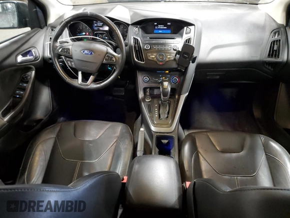 2016 Ford Focus SE z VIN 1FADP3F27GL216059, wystawiony jako Copart lot #59611395 z przebiegiem 170 468 mil mil oraz Szkoda całkowita • Salvage title. Historia ofert i sprzedaży dostępna na DreamBid. Obrazek 8.