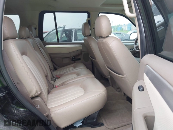 2004 Mercury Mountaineer Convenience z VIN 4M2ZU86K34ZJ16775, wystawiony jako IAAI lot #42216956 z przebiegiem 89 010 mil mil oraz . Historia ofert i sprzedaży dostępna na DreamBid. Obrazek 8.