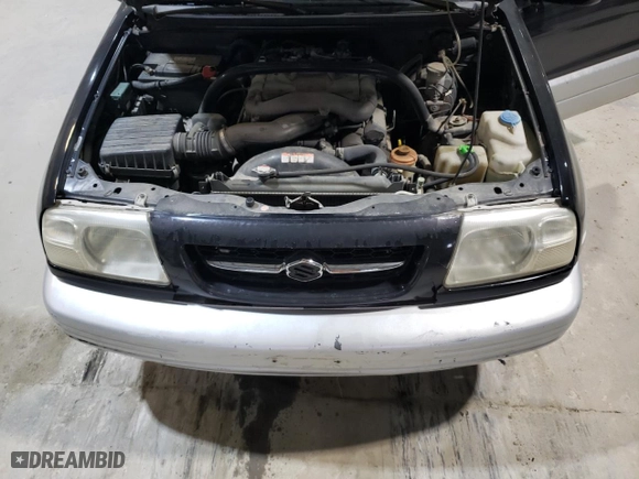 2000 Suzuki Grand Vitara JLX with VIN JS3TD62VXY4125624, listed as a Copart auction lot 87957045 with 175,923 mi miles and Salvage Title. Bid and sale history available at carsss.com. Image 12.