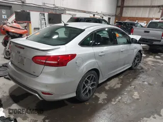 2015 Ford Focus SE with VIN 1FADP3F24FL272863, listed as a IAAI auction lot 41561084 with 103,875 mi miles. Bid and sale history available at carsss.com. Image 4.