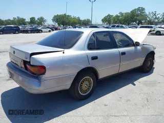 1995 Toyota Camry LE z VIN 4T1SK12E8SU872841, wystawiony jako IAAI lot #42025861 z przebiegiem 228 747 mil mil oraz . Historia ofert i sprzedaży dostępna na DreamBid. Obrazek 4.