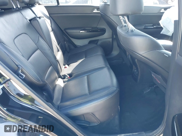 2018 Kia Sportage EX with VIN KNDPNCAC9J7324292, listed as a IAAI auction lot 41859338 with 124,519 mi miles and . Bid and sale history available at carsss.com. Image 8.