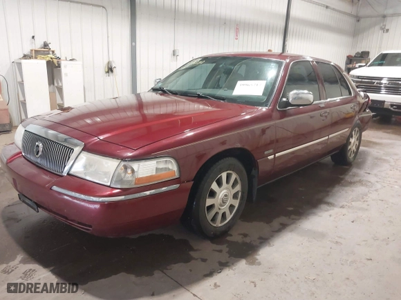 2004 Mercury Grand Marquis LS Premium with VIN 2MEHM75W64X620399, listed as a IAAI auction lot 39965717 with 136,046 mi miles. Bid and sale history available at carsss.com. Image 17.