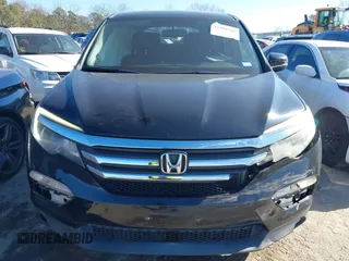 2016 Honda Pilot EX-L with VIN 5FNYF5H59GB005482, listed as a IAAI auction lot 41304248 with 127,092 mi miles and . Bid and sale history available at DreamBid. Image 13.