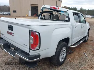2015 GMC Canyon 2WD SLE with VIN 1GTG5BE33F1132736, listed as a IAAI auction lot 41094687 with 26,185 mi miles. Bid and sale history available at carsss.com. Image 4.