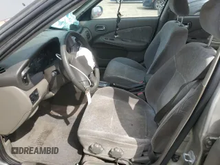 2003 Nissan Sentra XE with VIN 3N1CB51D33L782228, listed as a Copart auction lot 52156095 with 229,278 mi miles and Salvage Title. Bid and sale history available at DreamBid. Image 7.
