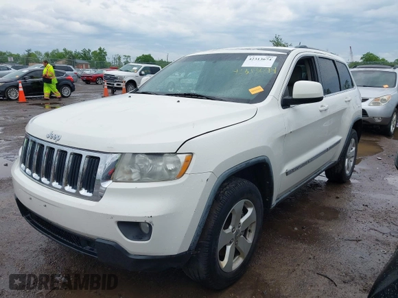 2011 Jeep Grand Cherokee Laredo z VIN 1J4RR4GG1BC572827, wystawiony jako IAAI lot #42313674 z przebiegiem 273 215 mil mil oraz . Historia ofert i sprzedaży dostępna na DreamBid. Obrazek 2.