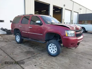 2010 Chevrolet Tahoe LTZ z VIN 1GNUKCE04AR167083, wystawiony jako IAAI lot #41338030 z przebiegiem 150 057 mil mil oraz . Historia ofert i sprzedaży dostępna na DreamBid. Obrazek 1.