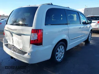 2013 Chrysler Town & Country Touring with VIN 2C4RC1BG7DR674253, listed as a IAAI auction lot 41854303 with 171,502 mi miles. Bid and sale history available at carsss.com. Image 4.