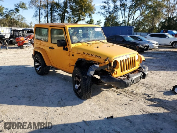 2012 Jeep Wrangler Rubicon with VIN 1C4BJWCG2CL135789, listed as a Copart auction lot 42556365 with 121,908 mi miles and Salvage title. Bid and sale history available at DreamBid. Image 4.