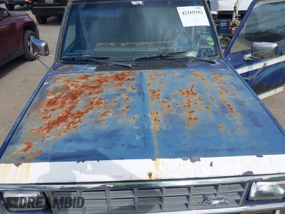 1987 Ford Ranger XL with VIN 1FTCR14A7HPB48449, listed as a IAAI auction lot 42169102 with 29,193 mi miles and . Bid and sale history available at DreamBid. Image 10.