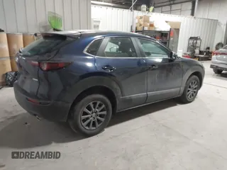 2023 Mazda CX-30 S with VIN 3MVDMBAM9PM586335, listed as a IAAI auction lot 41392541 with 12,463 mi miles and . Bid and sale history available at DreamBid. Image 4.