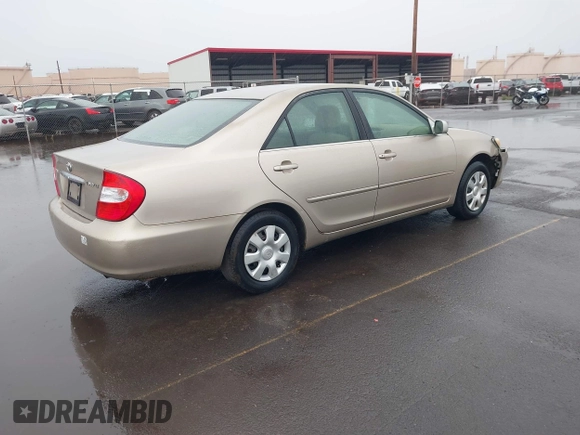 2002 Toyota Camry LE z VIN JTDBE32KX20022844, wystawiony jako IAAI lot #41392677 z przebiegiem 155 533 mil mil oraz . Historia ofert i sprzedaży dostępna na DreamBid. Obrazek 4.