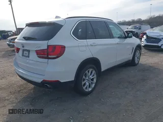 2016 BMW X5 xDrive35i with VIN 5UXKR0C5XG0P21683, listed as a IAAI auction lot 41717151 with 98,696 mi miles. Bid and sale history available at carsss.com. Image 4.