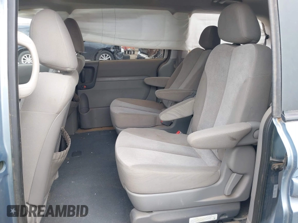 2011 Kia Sedona LX with VIN KNDMG4C70B6424016, listed as a IAAI auction lot 41964190 with 116,859 mi miles. Bid and sale history available at carsss.com. Image 8.