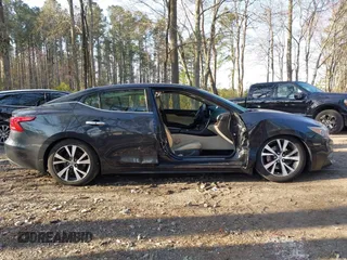 2017 Nissan Maxima SV z VIN 1N4AA6AP9HC399703, wystawiony jako IAAI lot #41858782 z przebiegiem 89 131 mil mil oraz . Historia ofert i sprzedaży dostępna na DreamBid. Obrazek 13.