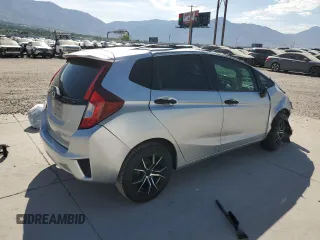 2016 Honda Fit LX with VIN JHMGK5H5XGX020620, listed as a Copart auction lot 60337295 with 103,827 mi miles and Salvage title. Bid and sale history available at DreamBid. Image 3.
