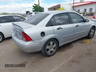 2003 Ford Focus ZTS with VIN 1FAFP38343W294841, listed as a IAAI auction lot 42040502 with 187,242 mi miles and . Bid and sale history available at carsss.com. Image 4.
