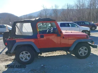 2006 Jeep Wrangler SE with VIN 1J4FA29S16P712101, listed as a IAAI auction lot 41347042 with 129,063 mi miles. Bid and sale history available at carsss.com. Image 13.