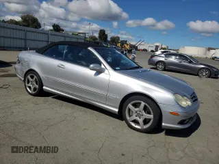 2005 Mercedes-Benz CLK 500 with VIN WDBTK75J85F153391, listed as a Copart auction lot 56691935 with 79,993 mi miles and Salvage title. Bid and sale history available at DreamBid. Image 4.