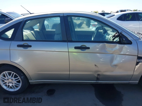 2008 Ford Focus SE with VIN 1FAHP35N68W154490, listed as a IAAI auction lot 42128643 with 141,316 mi miles. Bid and sale history available at carsss.com. Image 13.