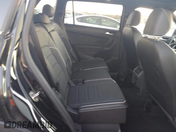 2023 Volkswagen Tiguan SEL R-Line z VIN 3VV4B7AX4PM125222, wystawiony jako Copart lot #79661984 z przebiegiem 9 024 mil mil oraz Szkoda całkowita • Salvage title. Historia ofert i sprzedaży dostępna na DreamBid. Obrazek 11.