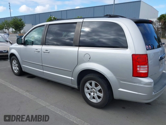 2010 Chrysler Town & Country Touring with VIN 2A4RR5D11AR432126, listed as a IAAI auction lot 42261584 with 135,638 mi miles and . Bid and sale history available at DreamBid. Image 3.