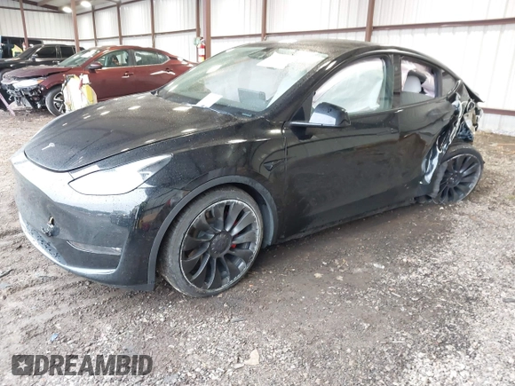 2023 Tesla Model Y Performance with VIN 7SAYGDEF2PF800641, listed as a IAAI auction lot 41612596 with 60,984 mi miles and . Bid and sale history available at DreamBid. Image 19.