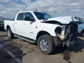 2021 Ram 2500 Big Horn z VIN 3C6UR5DLXMG648737, wystawiony jako IAAI lot #42066827 z przebiegiem 82 053 mil mil oraz . Historia ofert i sprzedaży dostępna na DreamBid. Obrazek 1.