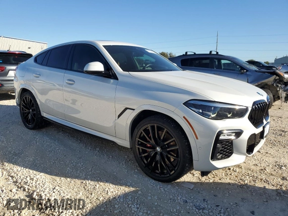 2021 BMW X6 sDrive40i z VIN 5UXCY4C01M9E24444, wystawiony jako Copart lot #79725094 z przebiegiem 119 066 mil mil oraz Czysty tytuł • Clean title. Historia ofert i sprzedaży dostępna na DreamBid. Obrazek 4.