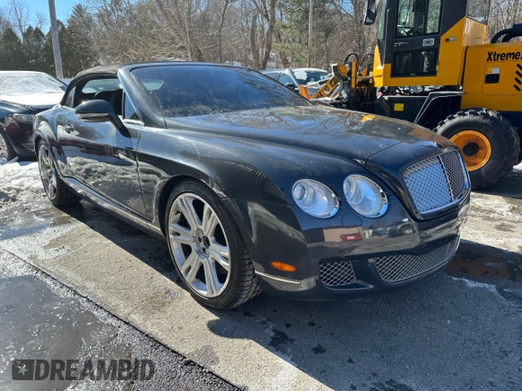2010 Bentley Continental GT with VIN SCBDR3ZA9AC066604, listed as a Copart auction lot 46725805 with 59,156 mi miles and Salvage Title. Bid and sale history available at DreamBid. Image 1.