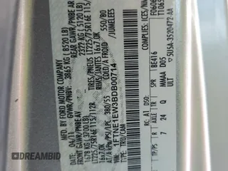 2011 Ford Econoline Cargo Commercial with VIN 1FTNE1EW3BDB00714, listed as a Copart auction lot 41963225 with 338,407 mi miles and Salvage Title. Bid and sale history available at DreamBid. Image 13.