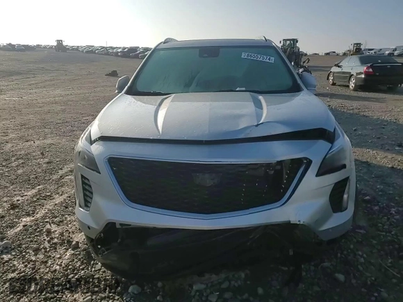 2021 Cadillac XT4 AWD Sport with VIN 1GYFZFR48MF007798, listed as a Copart auction lot 86557574 with 29,462 mi miles and Salvage title. Bid and sale history available at DreamBid. Image 12.