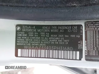 2003 BMW 3 Series 325i with VIN WBAAZ33403PH31680, listed as a IAAI auction lot 41726073 with 214,623 mi miles. Bid and sale history available at carsss.com. Image 9.