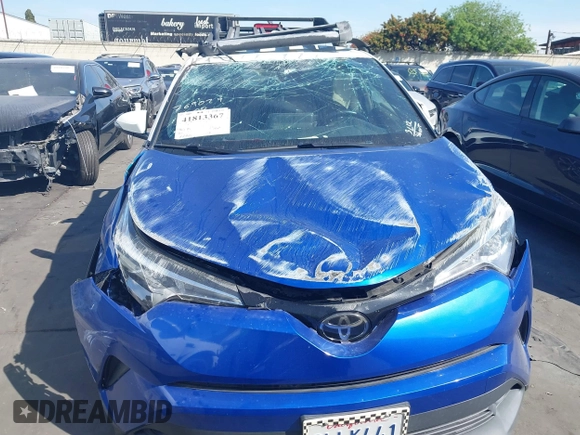 2019 Toyota C-HR XLE with VIN JTNKHMBX5K1043079, listed as a IAAI auction lot 41813367 with 77,879 mi miles and . Bid and sale history available at DreamBid. Image 13.