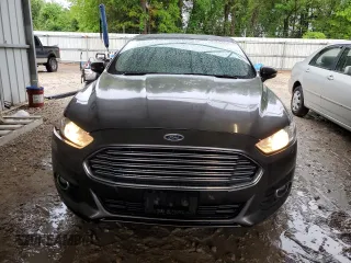 2016 Ford Fusion SE Hybrid with VIN 3FA6P0LU8GR316041, listed as a Copart auction lot 51864795 with 172,431 mi miles and Salvage Title. Bid and sale history available at carsss.com. Image 5.