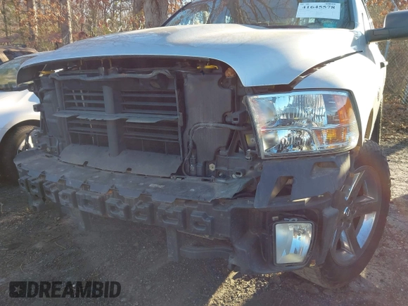 2018 Ram 1500 Tradesman z VIN 1C6RR7FT5JS186896, wystawiony jako IAAI lot #41645578 z przebiegiem 77 869 mil mil oraz . Historia ofert i sprzedaży dostępna na DreamBid. Obrazek 21.