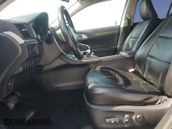 2012 Lexus CT 200h with VIN JTHKD5BH8C2086047, listed as a Copart auction lot 64361645 with 105,879 mi miles and Salvage title. Bid and sale history available at DreamBid. Image 7.