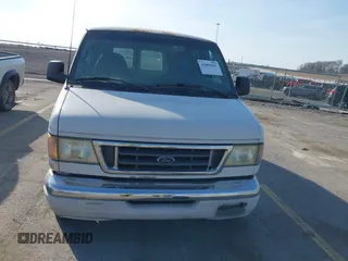 2003 Ford Econoline Cargo with VIN 1FTRE14213HA14635, listed as a IAAI auction lot 41805091 with 108,748 mi miles and . Bid and sale history available at DreamBid. Image 6.