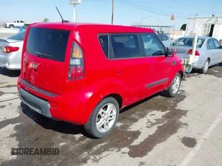 2010 Kia Soul + with VIN KNDJT2A28A7104493, listed as a IAAI auction lot 42023796 with 124,582 mi miles. Bid and sale history available at carsss.com. Image 4.