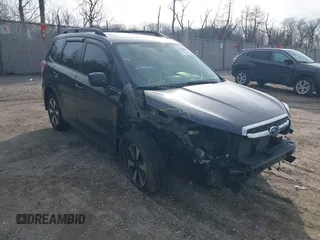 2018 Subaru Forester Premium with VIN JF2SJAGC0JH452501, listed as a IAAI auction lot 41871403 with 65,412 mi miles. Bid and sale history available at carsss.com. Image 1.
