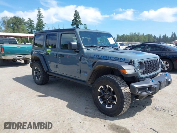 2024 Jeep Wrangler Rubicon X z VIN 1C4RJXR6XRW240316, wystawiony jako IAAI lot #42477607 z przebiegiem 41 375 mil mil oraz . Historia ofert i sprzedaży dostępna na DreamBid. Obrazek 1.