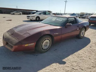 1986 Chevrolet Corvette with VIN 1G1YY0789G5118657, listed as a Copart auction lot 77743794 with 97,673 mi miles and Salvage Title. Bid and sale history available at carsss.com. Image 1.